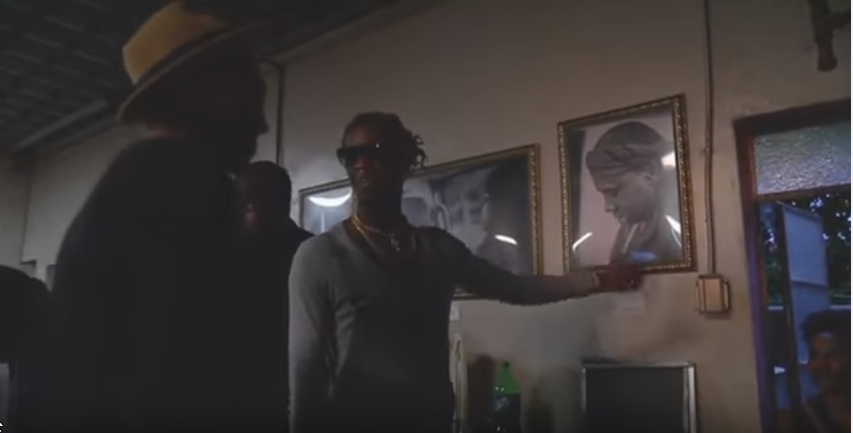 Look! Young Thug in boy clothes admiring a man. NOT DIFFERENT.